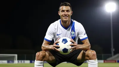 A photorealistic image of a Le Mans FC player, aged 25-30, wearing a white jersey with a blue stripe, a pair of black...